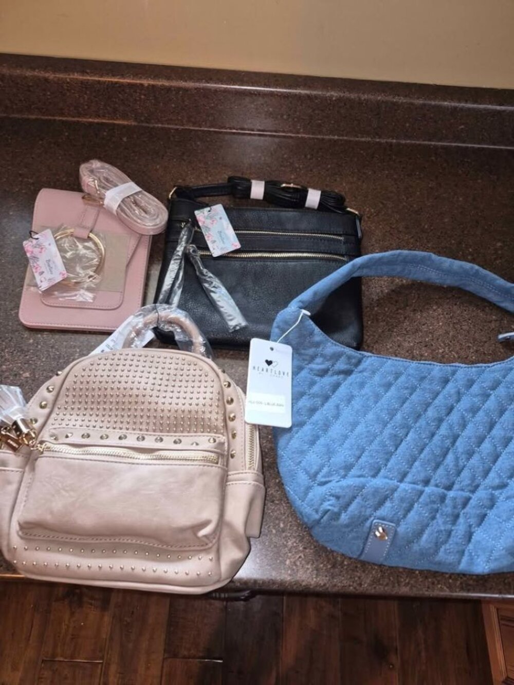 Lot of 4 handbags 3 brentano 1 heart love